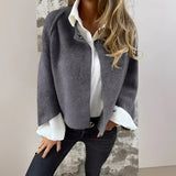 Gray wool jacket featuring a high collar and silver buttons, designed as stylish winter wear in 3XL size.