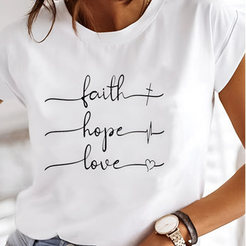 A person wearing a relaxed minimalist white graphic tee with a character design, smiling and showing their shoulder, with a watch visible on their wrist. The image emphasizes casual, stylish everyday wear for a comfortable fit.