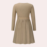 Ribbed black wrap dress with long sleeves and a V-neck in a skater style design.