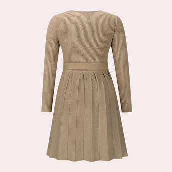 Ribbed black wrap dress with long sleeves and a V-neck in a skater style design.
