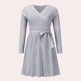 Ribbed gray long sleeve wrap dress in a skater style with a V-neck design, suitable for daytime wear and featuring a formal fashion design.