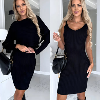 Ribbed brown long sleeve mini dress with belted waist, modeled by a person smiling. The dress has a fitted silhouette and falls above the knees, perfect for fall fashion. The model is wearing black shoes and standing in a well-lit setting.