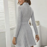 Ribbed grey high neck sweater dress featuring long sleeves, a fitted silhouette, and a knee-length hem, perfect for elegant autumn fashion.
