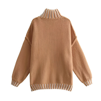 Unisex oversized ribbed mock neck wool sweater in black and tan with long sleeves and a cozy fit.