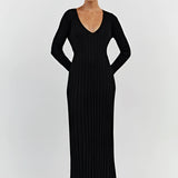 Ribbed cream maxi sweater dress with a V-neck design and long sleeves, showcasing a flattering sheath silhouette perfect for fall fashion.