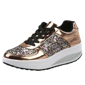 Rose gold glitter platform sneakers designed for women, featuring a trendy and eye-catching style ideal for parties, with a sporty yet fashionable appearance.