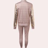 Rose gold velvet tracksuit with sequin detail for women, featuring a luxurious design with long sleeves and a stylish collar.