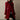 
A red double-breasted women's designer trench coat in size 3XL, featuring a structured collar, long sleeves, and a fitted waist.