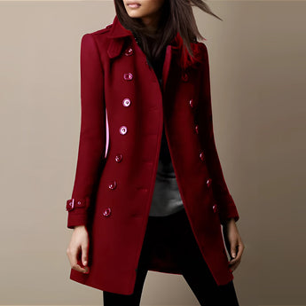 
A red double-breasted women's designer trench coat in size 3XL, featuring a structured collar, long sleeves, and a fitted waist.