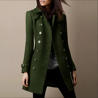Royal blue double-breasted women's designer trench coat with a tailored fit, featuring a classic collar, long sleeves, and a belt at the waist.