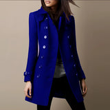 Royal blue double-breasted women's designer trench coat in size 3XL, featuring a tailored fit with a stylish collar, long sleeves, and a waist belt for a flattering silhouette.