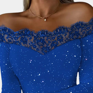 Royal blue off-shoulder lace evening top for women displaying intricate lace detailing and elegant neckline, highlighting shoulders and arms.