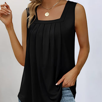 A woman wearing a royal blue sleeveless flowy summer top with back button closure, showcasing the shoulder and waist areas.