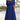Plus-size royal blue V-neck A-line midi dress with three-quarter sleeves.