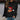 A black women's Christmas sweatshirt in size 3XL featuring a festive design of Rudolph the Reindeer, with long sleeves and a comfortable pullover style.