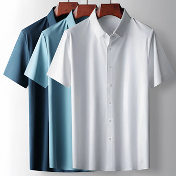 A sage green men's short sleeve mandarin collar dress shirt with buttons.
