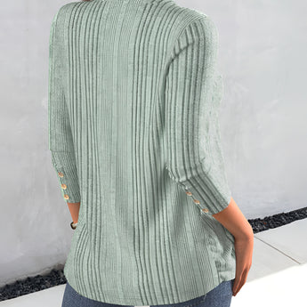 Sage green v-neck ribbed blouse featuring a casual and lightweight design with a comfortable fit, highlighting its textured ribbed fabric and stylish neckline.