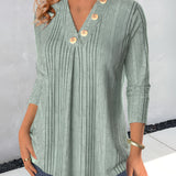 Sage green V-neck ribbed blouse with long sleeves, featuring a casual lightweight design for women.