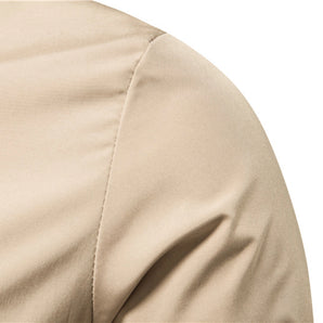 A satin beige pillowcase displayed on a bed, showcasing its luxurious, wrinkle-free fabric with a smooth, hypoallergenic texture, exuding comfort and elegance in a soft, peachy tint.