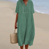 Sea Blue Linen Maxi Dress with a V-neck design, long sleeves, and a flowing silhouette, in a vibrant electric blue color. The dress is styled for casual, lightweight beachwear, perfect for warm weather outings.