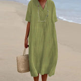 Sea blue linen maxi dress with a V-neck design, featuring short sleeves. The dress is lightweight and casual, suitable for beachwear. It is a one-piece garment with a fashion-forward design, tailored at the waist. The dress is available in light green and size 2XL.