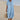Sea blue linen maxi dress with a V-neck and short sleeves, designed as casual lightweight beachwear. The dress features a loose fit around the waist, ideal for summer outings, and is shown in a vibrant electric blue color, size 2XL.