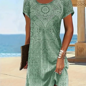 Sea green women's lace dress with short sleeves, fitted waist, and knee-length hemline, perfect for casual summer beachwear.