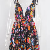 Sparkly festival outfit featuring a black sequin skater skirt and a black backless halter top in XL, displayed on a clothes hanger.