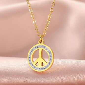 Gold Peace Sign Pendant - Moon & Stars Celestial Boho Chic Necklace with round medal featuring celestial symbols.