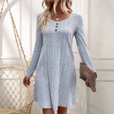 Silver ribbed long sleeve backless knit sweater dress for women, showcasing a chic winter fashion design with a fitted silhouette, high neckline, and stylish ribbed texture.