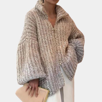Silver sequin bridal shawl in khaki, elegantly draped over shoulders and upper body, showcasing a stylish wrap design with a subtle beige tone, perfect for an evening event or bridal occasion.