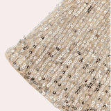 Silver sequin V-neck sleeveless tank top with a sparkling embellishment pattern, designed for evening wear.