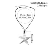 Handmade Silver Star Pendant Necklace with Celestial Galaxy Design featuring a delicate silver chain and intricate detailing.