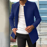 Men's slim fit camel coat in blue, modeled by a man wearing a dress shirt and jeans, highlighting the coat's modern design with a focus on the collar and sleeves, suitable for autumn fashion.