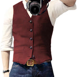 Slim-fit denim vest for men in stylish blue, featuring a button-up design, worn over a white dress shirt. 