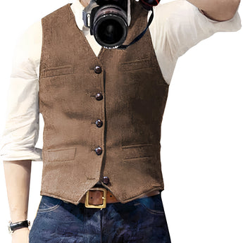 Slim-fit blue denim vest for men with button-up front and collar, worn over a white dress shirt.