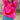 
A women's oversized white knit sweater featuring a prominent yellow smiley face emoji design on the front. The sweater is worn by a model, showcasing the long sleeves and relaxed fit. The image captures the sweater's trendy and playful style, perfect for casual wear. 