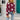 Blue and white crewneck sweater with a star pattern, featuring long sleeves and a casual knit design, styled with jeans for a fashionable look.