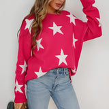 Blue and white star pattern crewneck sweater displayed on a mannequin, showing full sleeves and a casual knitwear design, paired with jeans.
