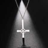 Steampunk silver gear cross pendant necklace featuring intricate industrial design, representing Christian symbolism and body jewelry.