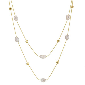 Sterling Silver Pearl Double Strand Choker - Effie Queen Elegant Jewelry, featuring irregularly shaped gold pearls, intricately designed as a fashion accessory.