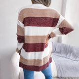 Black and white striped women's long sleeve cardigan, featuring a knit texture and fall fashion design elements.