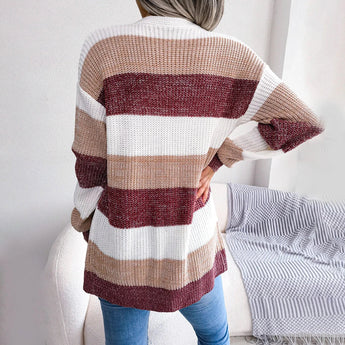 Black and white striped women's long sleeve cardigan, featuring a knit texture and fall fashion design elements.