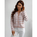 Striped pink and white knit cardigan with a button-up front, displaying long sleeves and a collared neckline, suitable for a casual chic look.