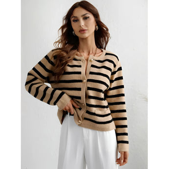 Striped blue and white knit cardigan with a casual chic style, featuring a button-up front. The sweater has long sleeves and a collar, suitable for a fashionable and relaxed look.