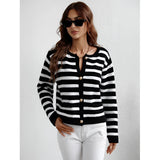 Striped blue and white knit cardigan with black accents, featuring a casual chic button-up design. The sweater is styled with long sleeves and a collar, suitable for outerwear.