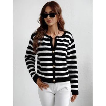 Striped blue and white knit cardigan with black accents, featuring a casual chic button-up design. The sweater is styled with long sleeves and a collar, suitable for outerwear.