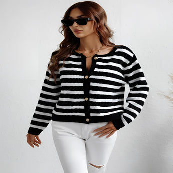 Striped blue and white knit cardigan with button-up front, featuring long sleeves and a casual chic style.