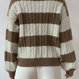 Brown beige striped cable knit women's sweater with puff sleeves and a crewneck design.