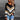 Striped Chevron V-Neck Knit Sweater in black, white, and beige with long sleeves, a v-neckline, and a pullover style. The sweater is displayed in a 3XL size, highlighting its casual and fashionable design.